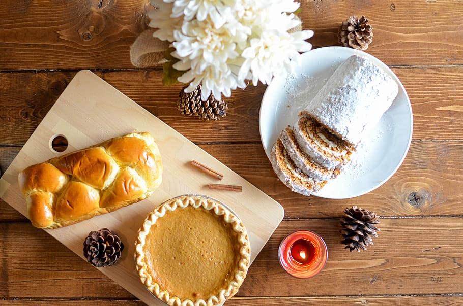 cake pie beside pine cones, assorted pastries, flatlay, table HD wallpaper