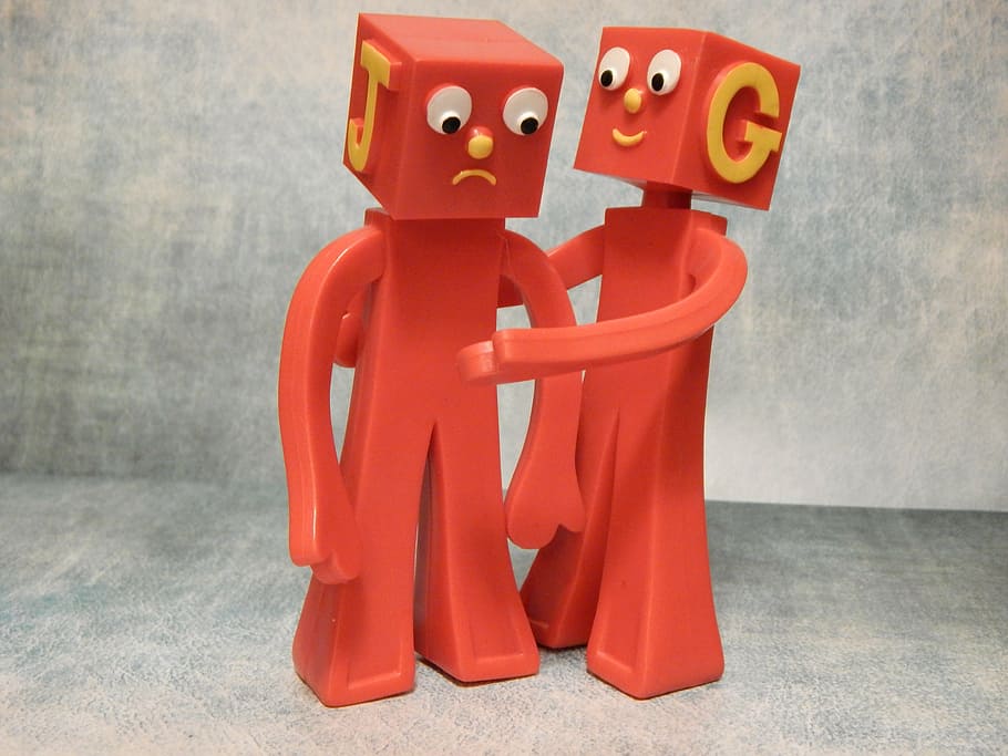 red letter J and G plastic toys, friends, comfort, care, cheer up