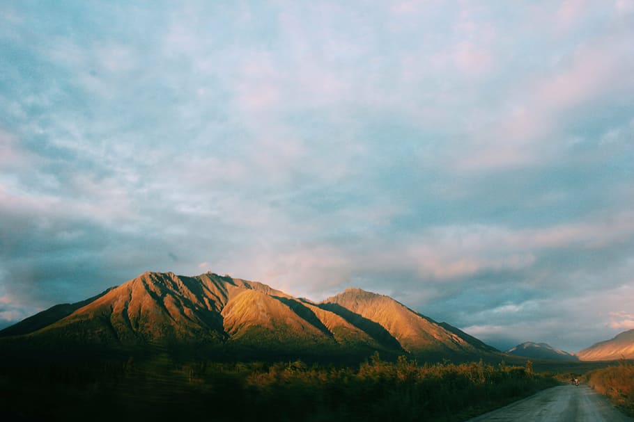 landscape photography of brown mountains, daytime, sky, clouds HD wallpaper