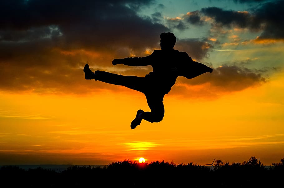 silhouette of man kicking on air, sky, clouds, sunset, tree HD wallpaper