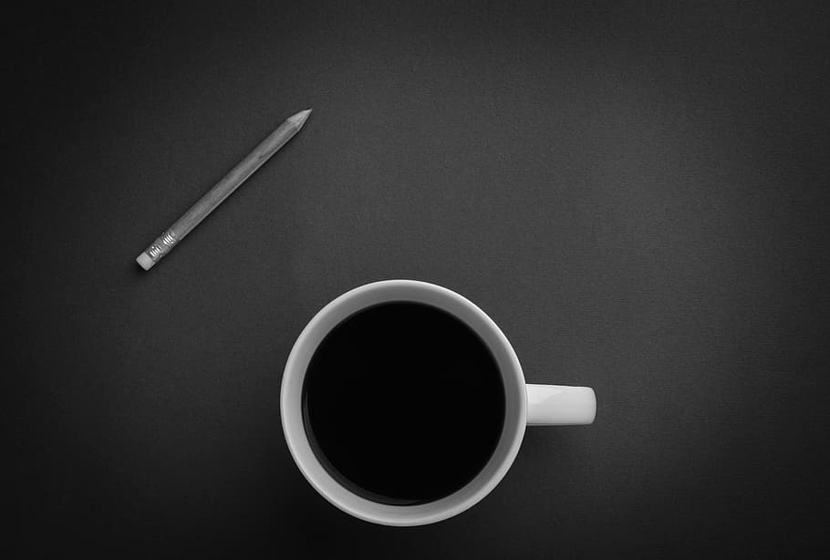 white ceramic teacup near gray pencil on black surface, white ceramic mug beside pencil, HD wallpaper