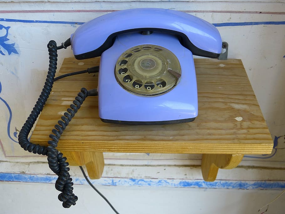 blue rotary phone on brown wooden shelf, communication, connection