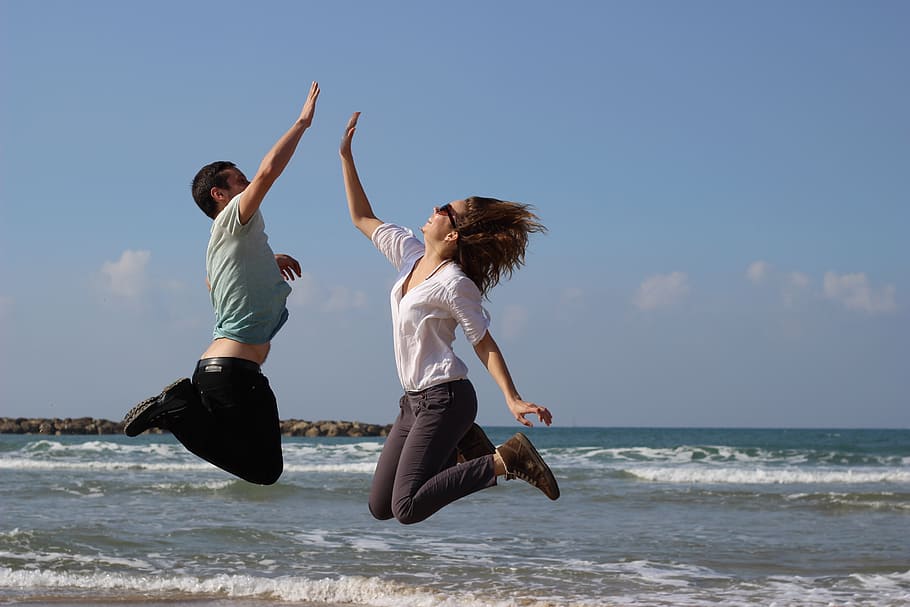 man and woman jumping photo in the sea, fun, cotton, running HD wallpaper