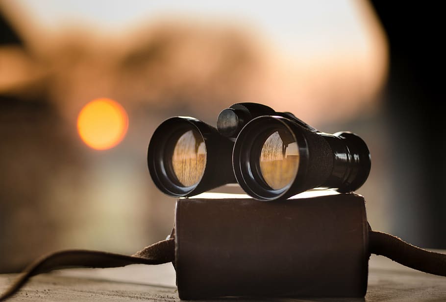 black binoculars on beige surface, dusk, sunset, birding, scene HD wallpaper
