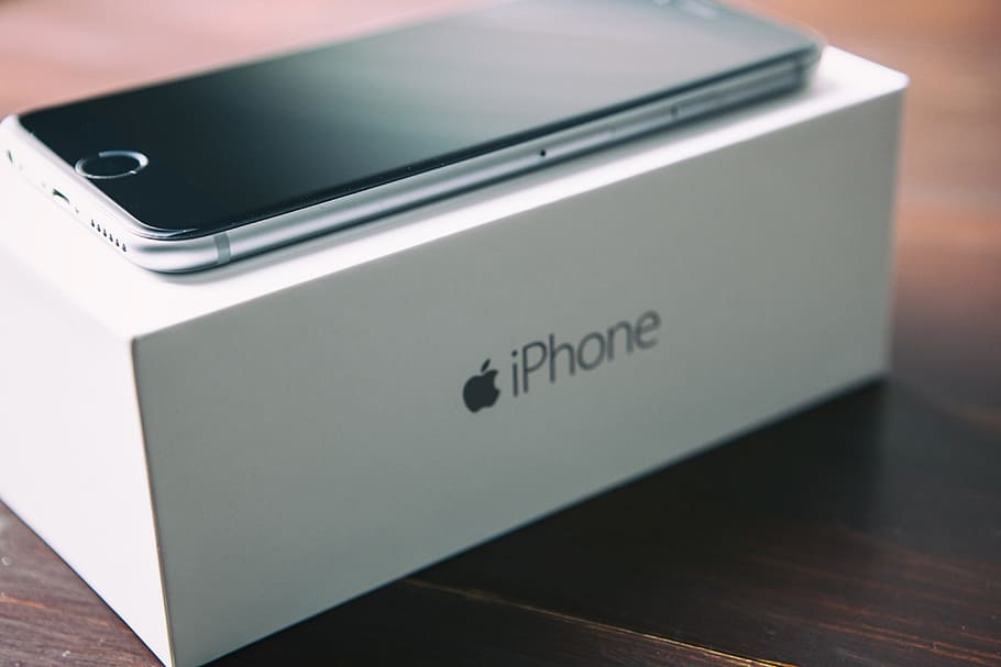 Close-up shot of the iPhone 6 mobile smartphone and original box, HD wallpaper