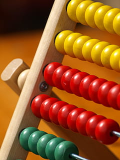 closeup photo of yellow, red, and green abacus, slide rule HD wallpaper