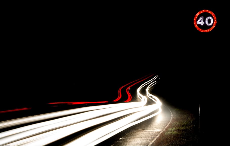 long-exposure photography of light streaks on road during nighttime, time laps photography of cars at the road during night