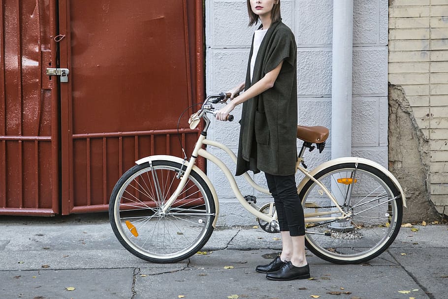 woman holding white beach cruiser bike, bicycle, fashion, fashion model