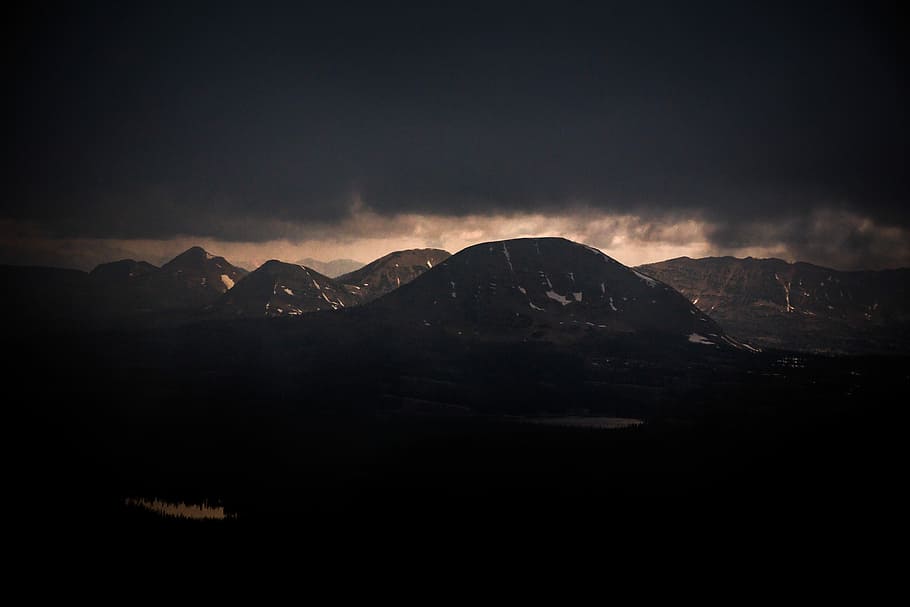 silhouette of mountain under cloudy sky, mountain rage view under cloudy sky during daytime HD wallpaper