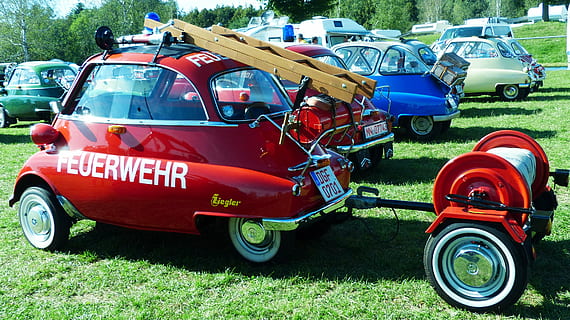 red Feuerwehr vehicle on green grass, bmw, isetta, fire, snogging ball HD wallpaper