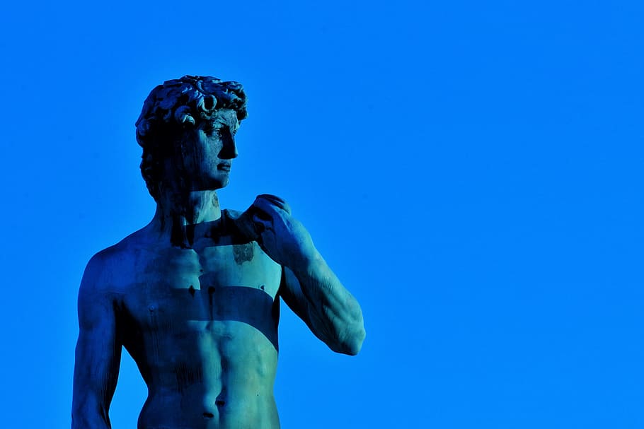 statue of David on blue background, guerrero, angel, future, target