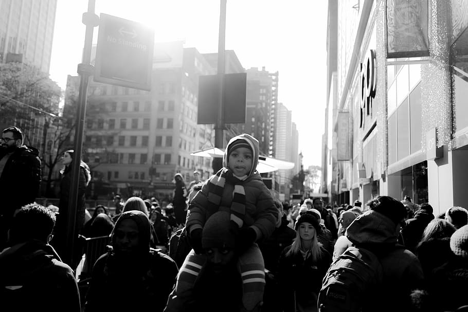 grayscale photography of crowd of people, grayscale photo of people standing beside building HD wallpaper