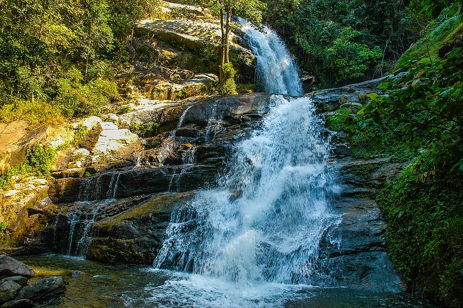 water falls through rock, waterfall, landscape, murmur, beauty in nature HD wallpaper