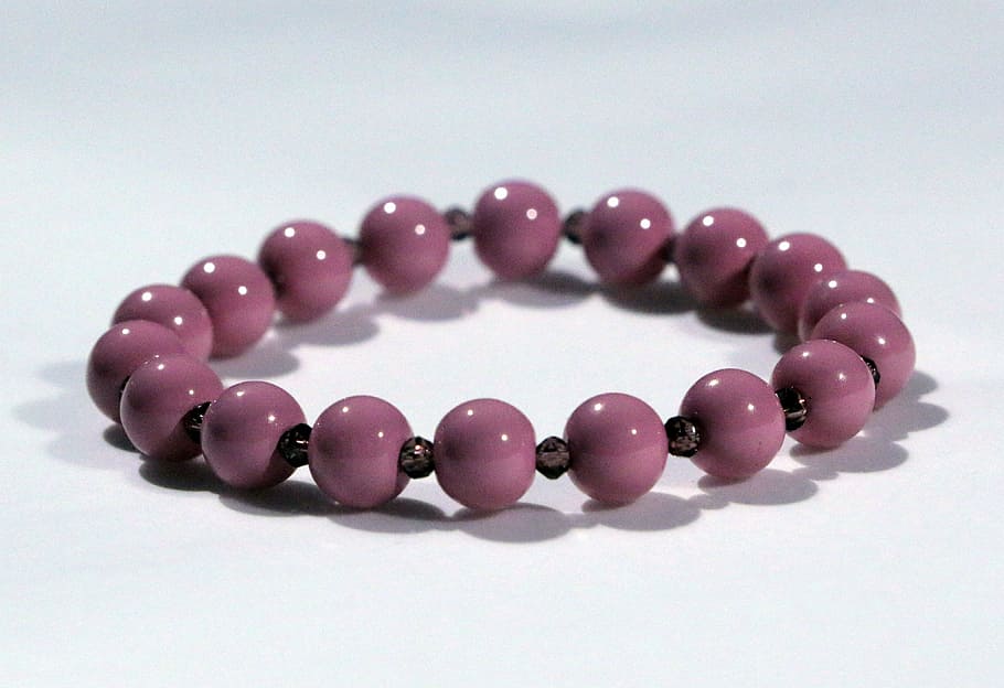 beaded purple bracelet on white surface, jewelry, fantasy, studio shot, HD wallpaper