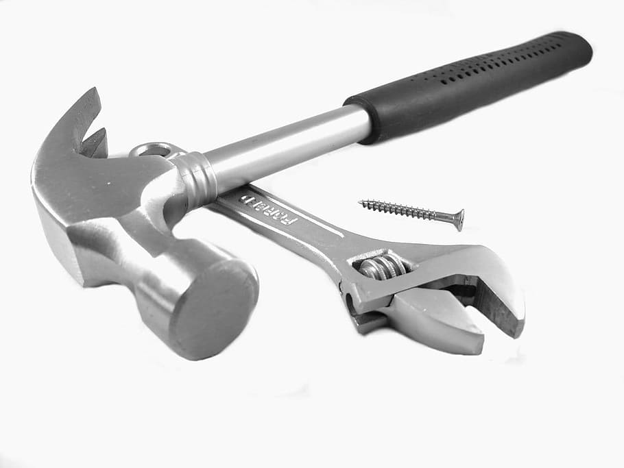 black and gray claw hammer and gray adjustable wrench, tools