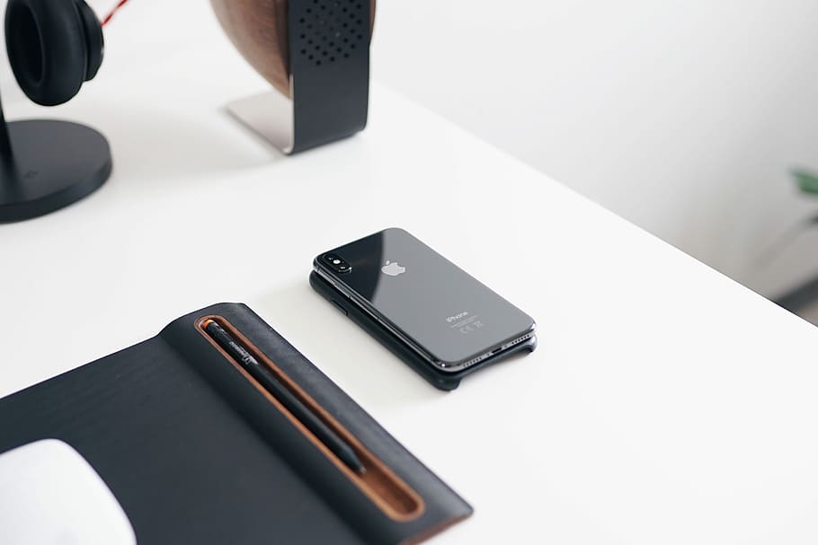 space gray iPhone X on desk, iPhone on desk, flat lay, workspace HD wallpaper