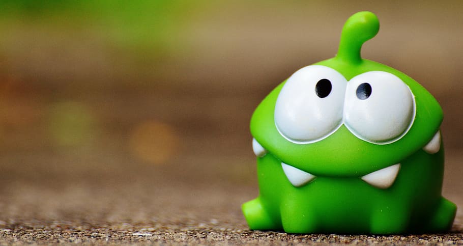green cut the rope frog toy on brown surface, figure, funny, cute, HD wallpaper
