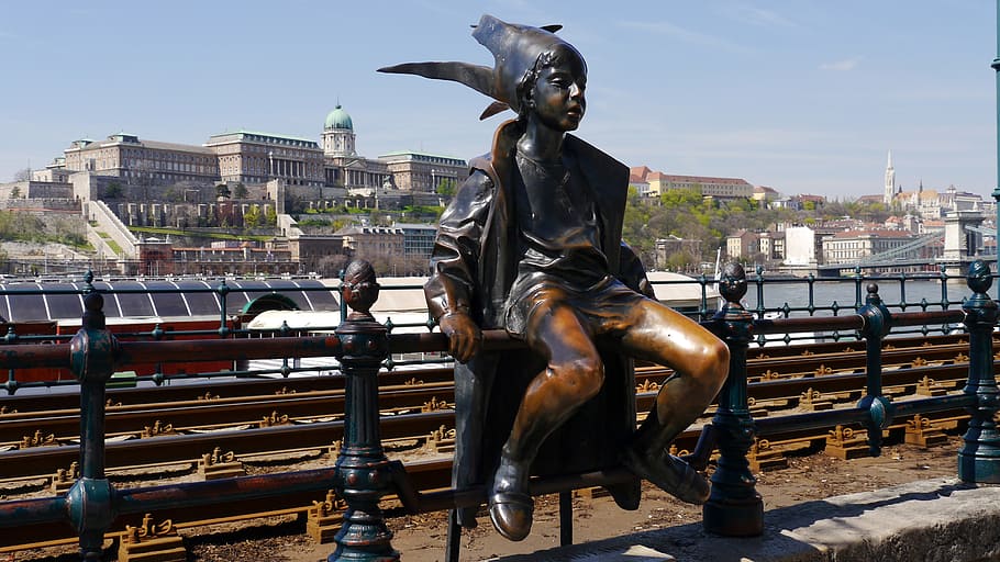 boy sitting on railing statue at daytime, street statue, budapest HD wallpaper
