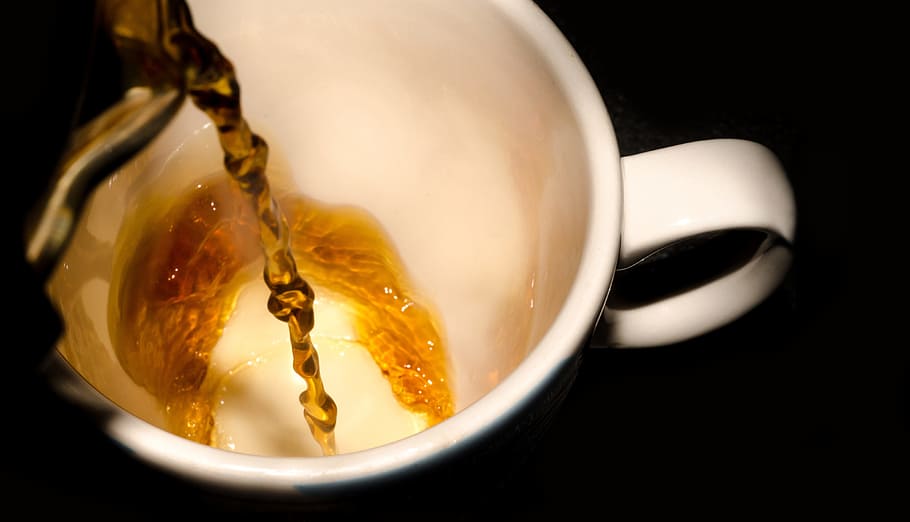 yellow liquid pour on white ceramic mug, coffee, cup, pouring, HD wallpaper