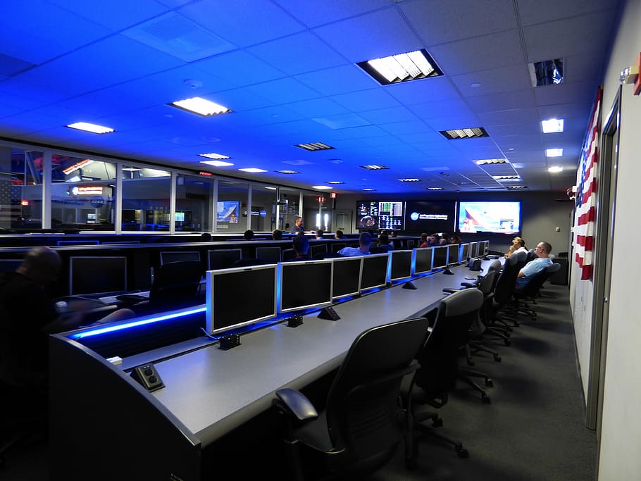 two men using computers in room, control center, laboratory, nasa
