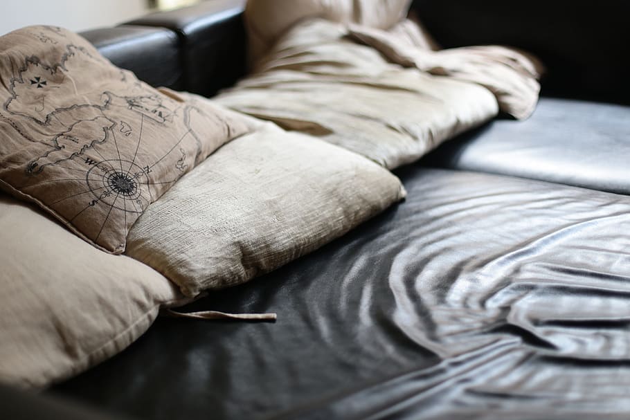 square beige throw pillows on black bed, funriture, sofa, couch HD wallpaper