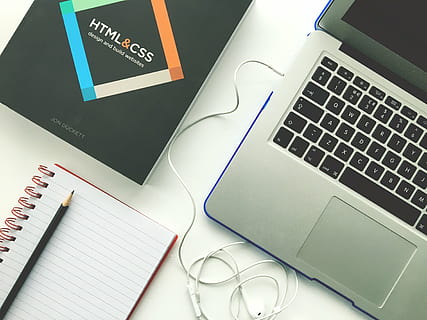 MacBook Pro beside spiral notebook, web design, laptop, html HD wallpaper