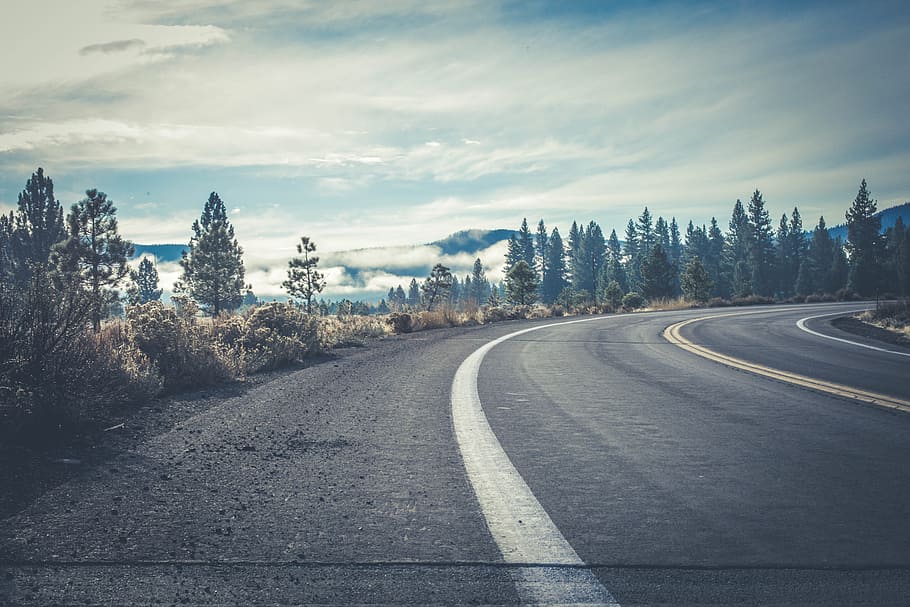 Gray Concrete Road Near Forest, asphalt, clouds, daylight, dirt HD wallpaper
