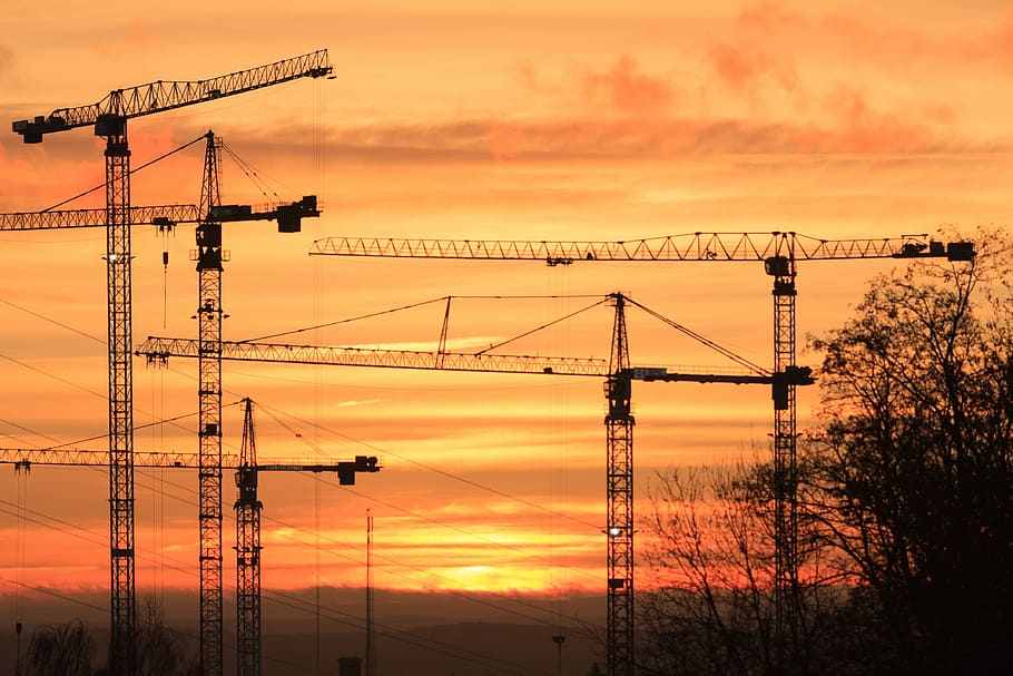 construction cranes silhouette at golden hour, industry, sky HD wallpaper