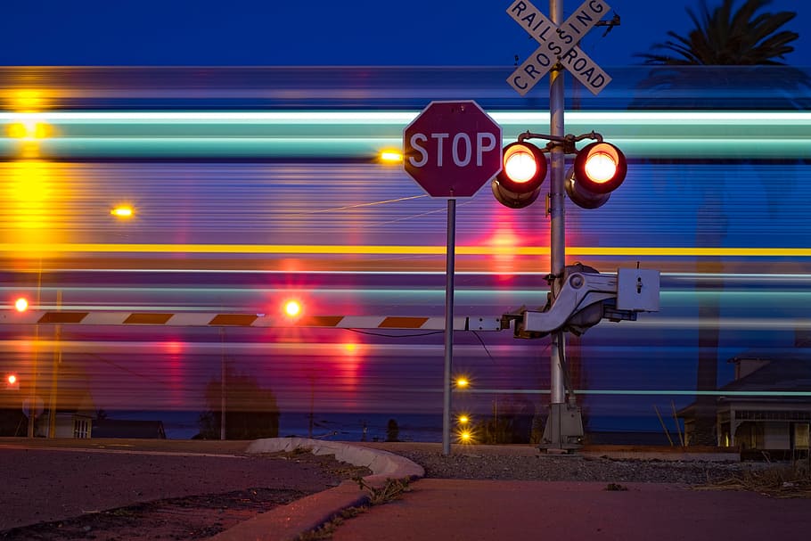 Train crossing, various, blur, blurred, city, motion, night, speed, HD wallpaper