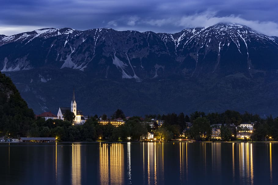 photo of buildings near mountain, bled, slovenia, landscape HD wallpaper