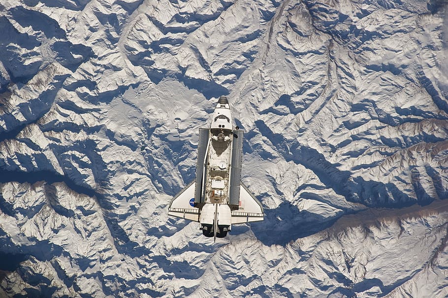 aerial photo of white and gray aircraft, atlantis, space shuttle