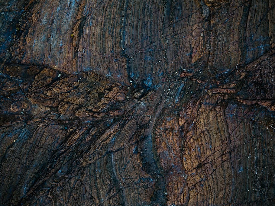 brown and blue rock, brown wooden surface, cliff, layers, beach HD wallpaper