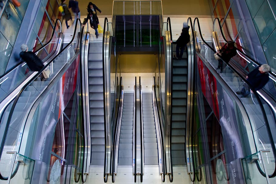 people riding on a escalator inside a buildings, urban, shopping HD wallpaper