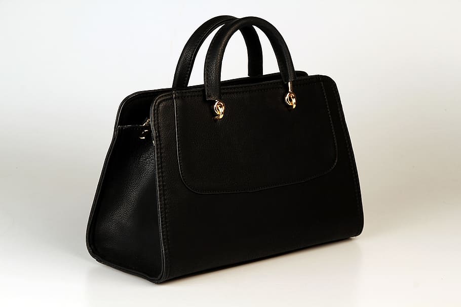 black leather handbag on white surface, gold, black color, indoors HD wallpaper