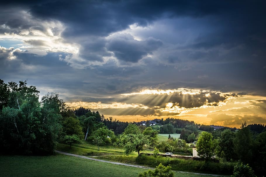 sunrays behind the clouds, landscape photography of mountains and trees HD wallpaper