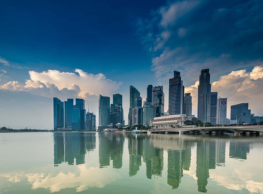 high-rise building near body of water, urban Skyline, skyscraper HD wallpaper