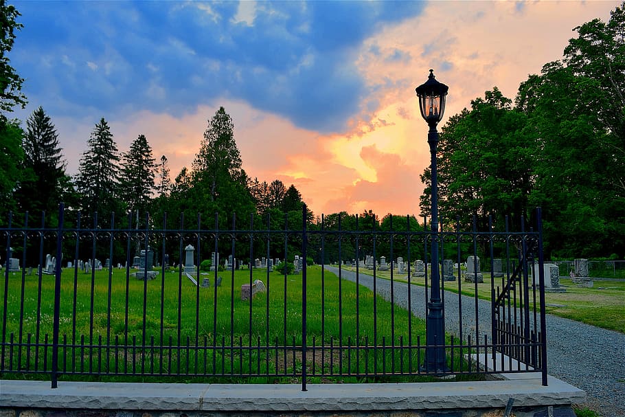 sunset, clouds, orange, colorful, ominous, cemetery, gate, fence HD wallpaper