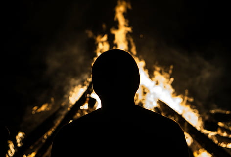 silhouette photography of person standing near fire, man, dark HD wallpaper