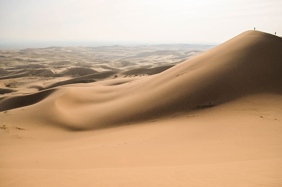desert sand during daytime, sunlight over desert sand, people HD wallpaper