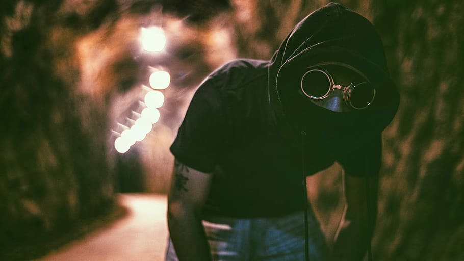 man with kanji text bicep tattoos wearing black hoodie and blue denim bottoms, selective focus photography of a man inside tunnel, HD wallpaper