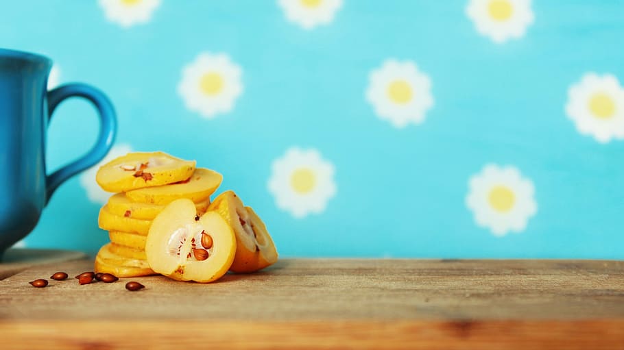 pile of fruit slices, closeup photo of sliced apples on brown wooden surface HD wallpaper