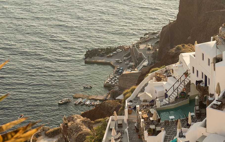 Santorini, Greece, resort with pool on mountain cliff, building complex HD wallpaper