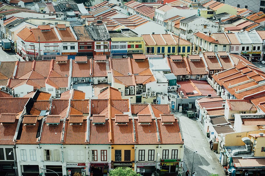 aerial view of orange and white house, aerial view photography of city HD wallpaper