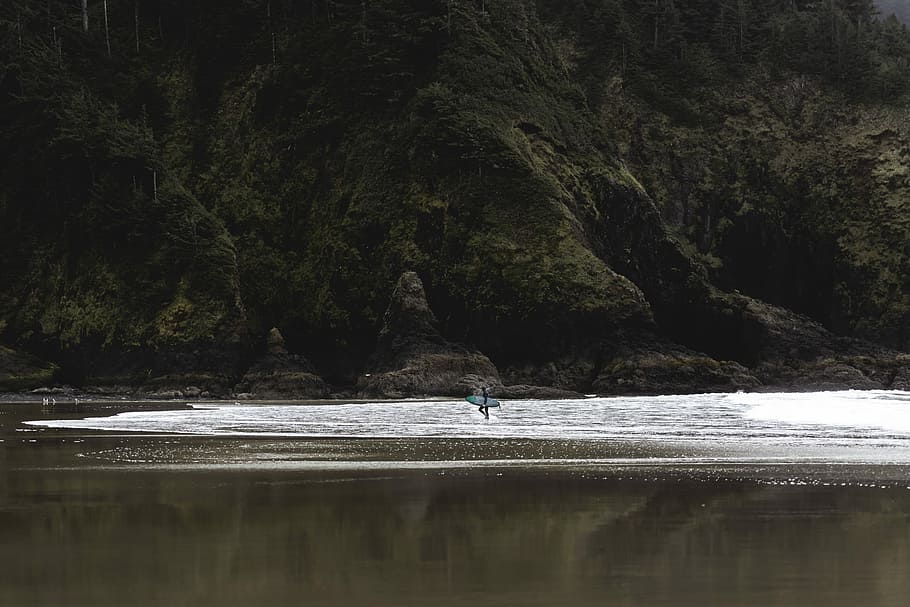 person near body of water, beach, surf, surfer, cliff, sand HD wallpaper