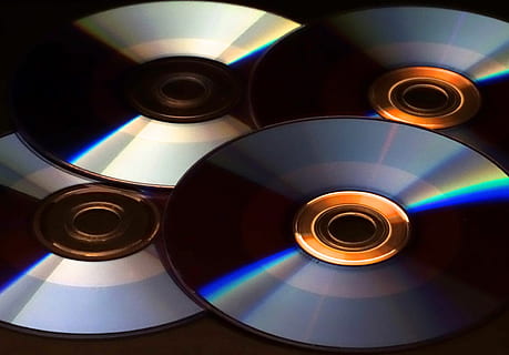 cd or dvd, storage data information technology. music and movie record.  holographic side of the compact disc. a compact disc isolated on black  background. 4686972 Stock Photo at Vecteezy