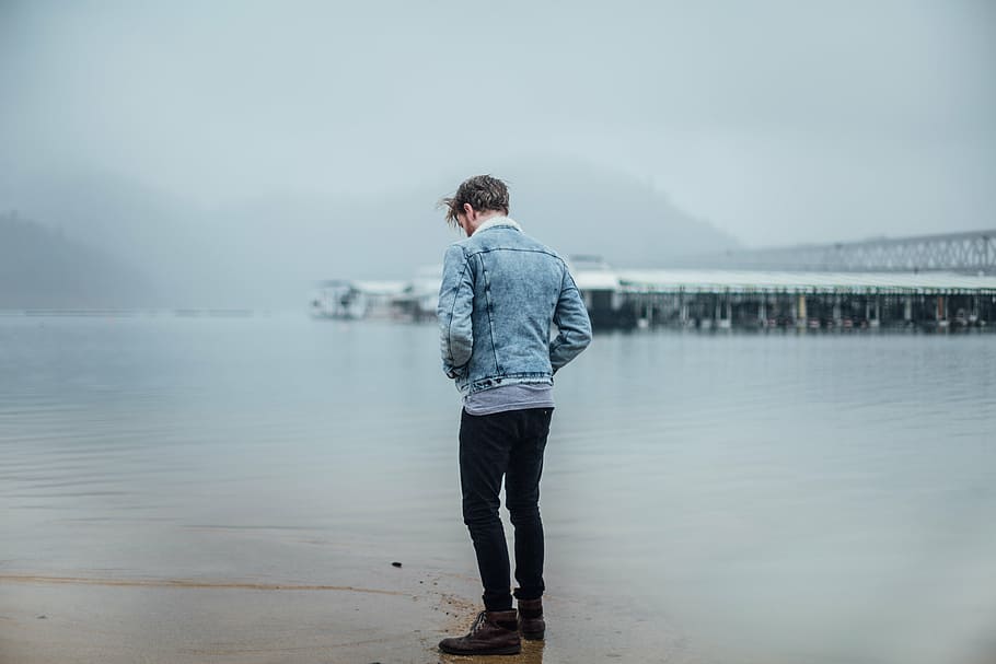 man standing on shore, wearing, gray, denim, jacket, black HD wallpaper