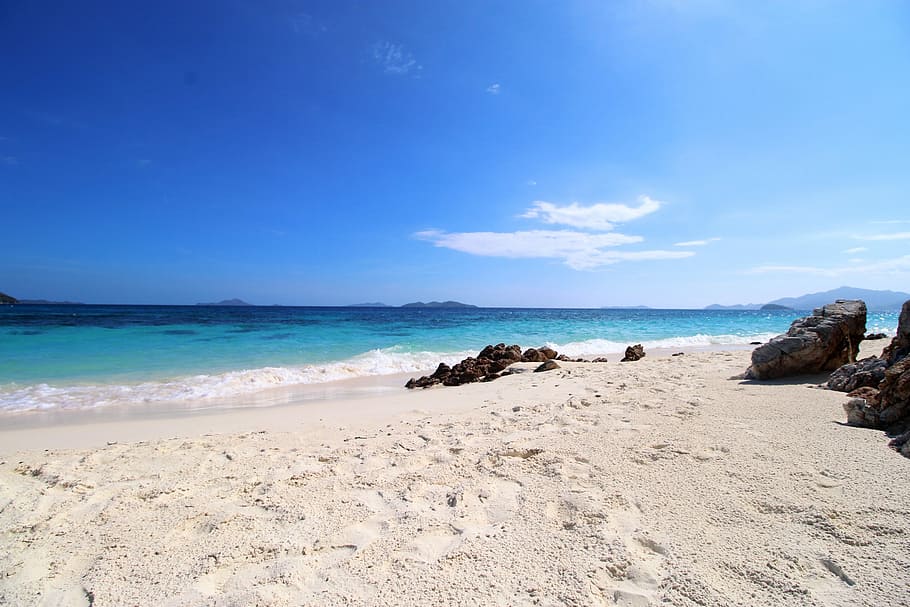 body of water and seashore, sand, beach, travel, malcapuya island HD wallpaper
