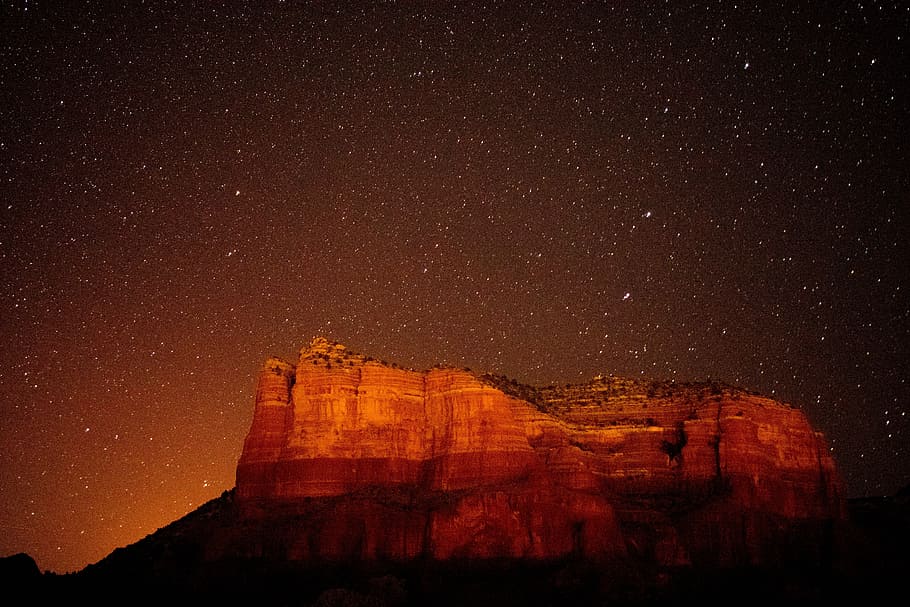 landscape photo of brown mountain, brown canyon during night HD wallpaper