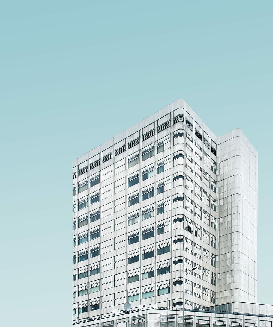 architectural photography of white concrete high-rise building, white concrete building closeup photography HD wallpaper