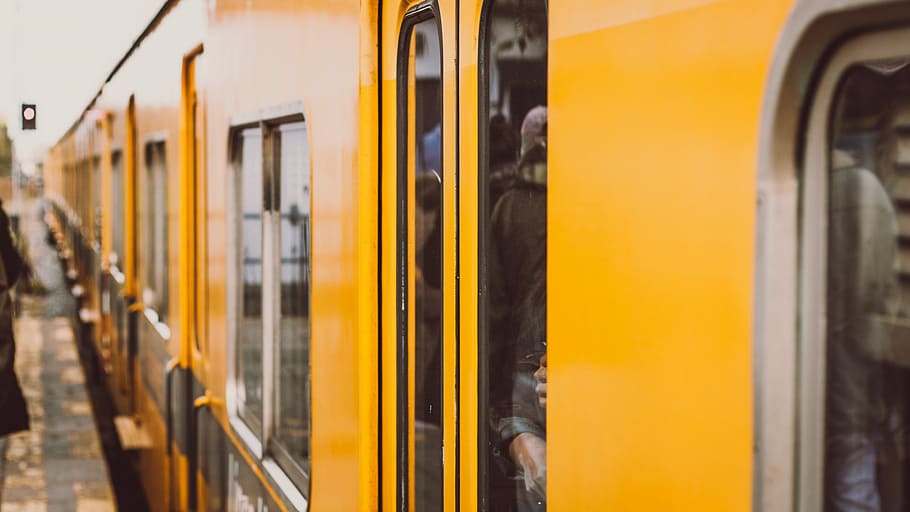 photo of yellow train, person, transportation, station, platform, HD wallpaper
